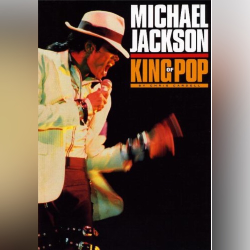 Michael Jackson King Of Pop book with colorful images New